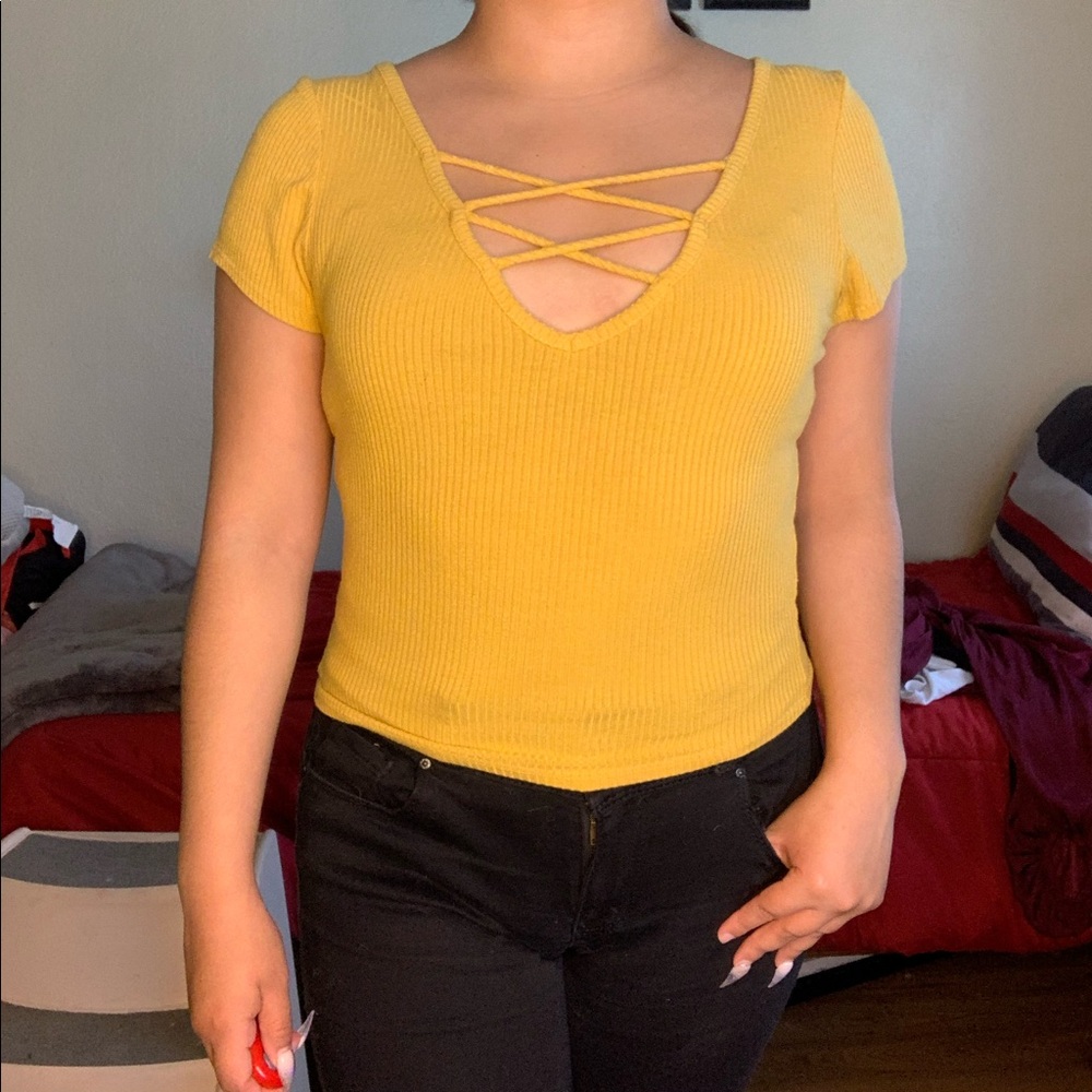 Yellow V neck shirt